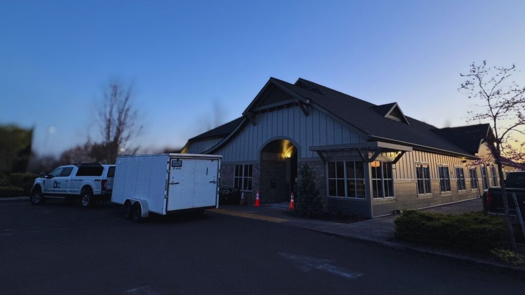 evening view of preparation work for commercial painting job by DCI