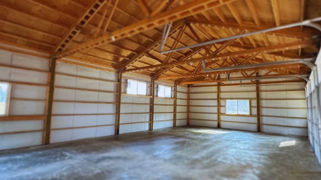 interior view of framing work on a white oregon pole barn