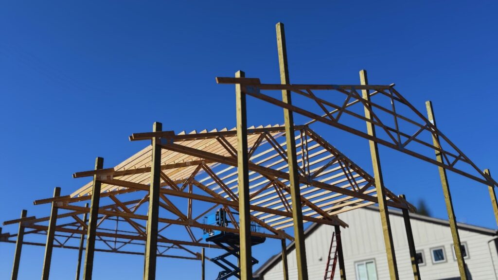 framing work in progress for an oregon pole barn