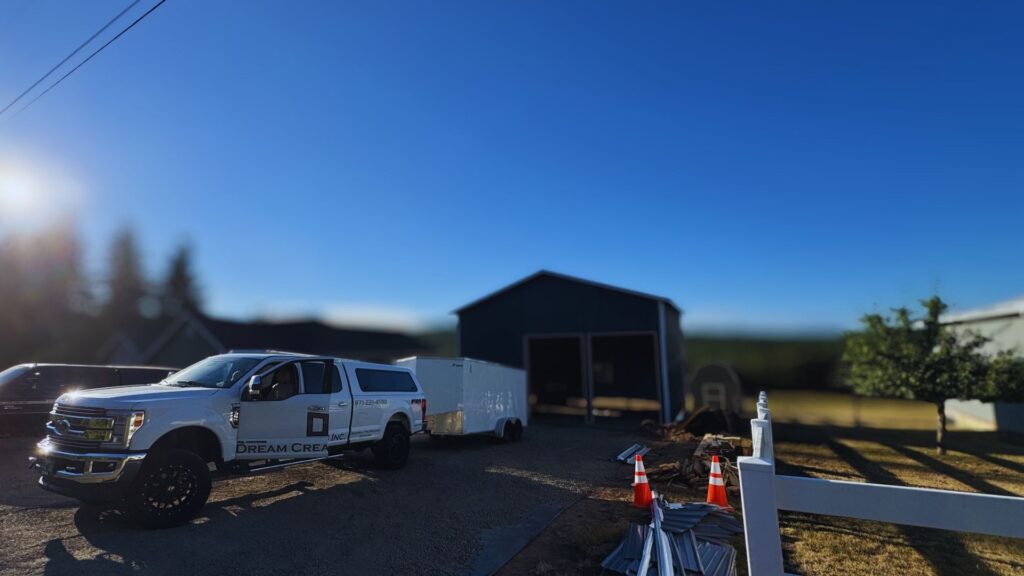 Construction pole barn post completion with a view of DCI's truck in the foreground